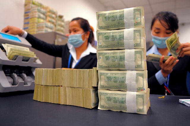 ប្រាក់ចំណេញរបស់ធនាគារអេស៊ីលីដាធ្លាក់ចុះជិត10ភាគរយក្នុងឆមាសទី1