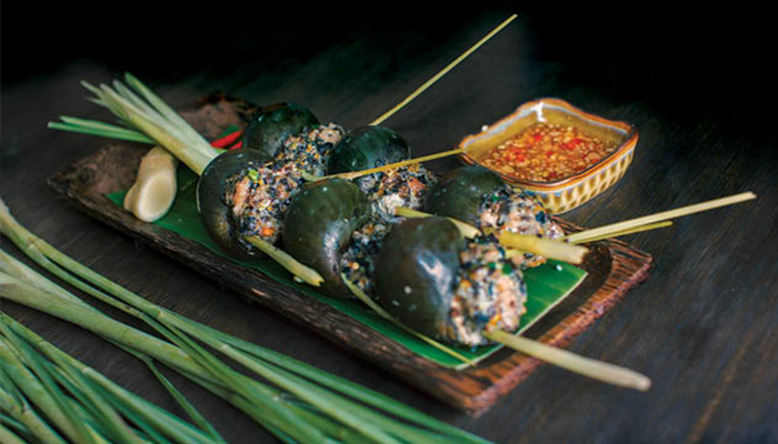 ខ្យងខ្ចប់សាច់ជ្រូកចិញ្ច្រាំស្លឹកគ្រៃ